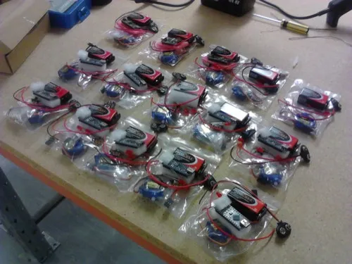 A photo of 3D printed robot kits awaiting assebly