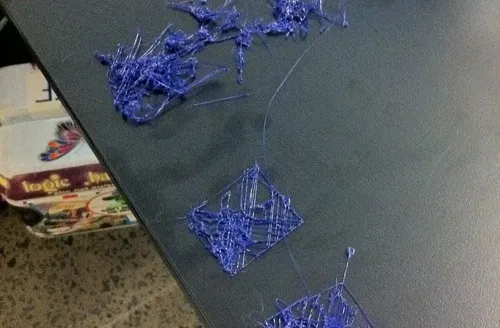 a photo of a failed blue 3D print