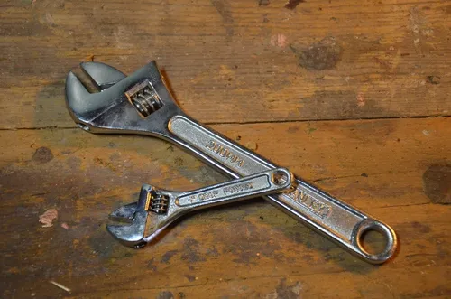 A photo of two adjustable wrenches