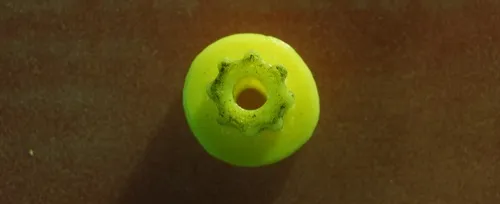 A photo of a slightly elipcical 3D printed pulley