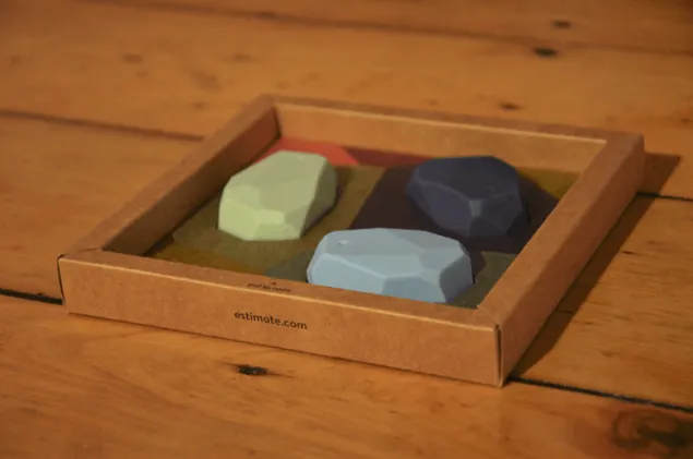 Picture of estimote ibeacons in original packaging.