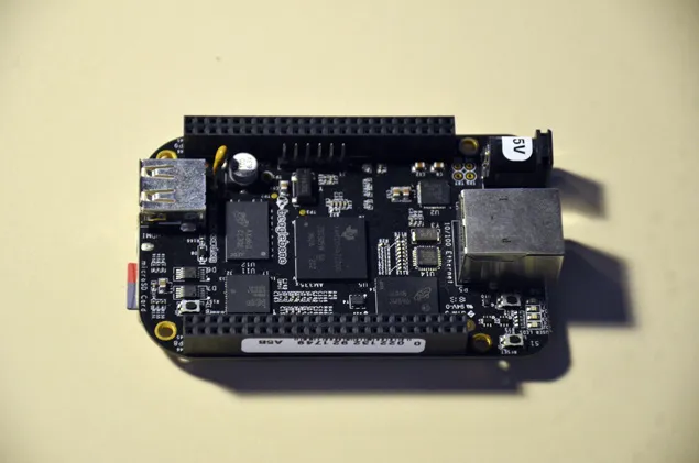 A photo of a SanDisk extreme microSD card installed in a BeagleBone Black.