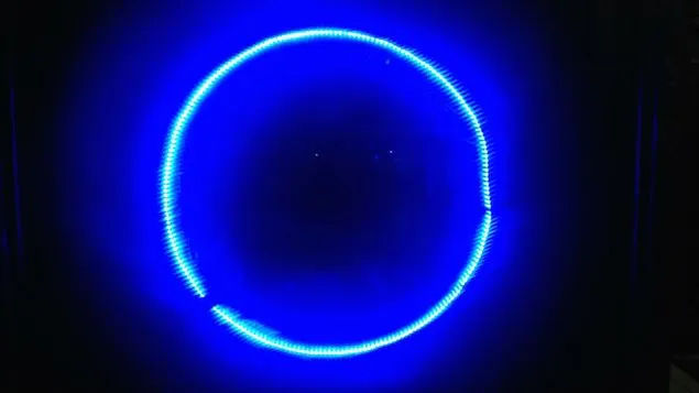 Photo of a circular LED light strip out front of a Cairns backpackers.