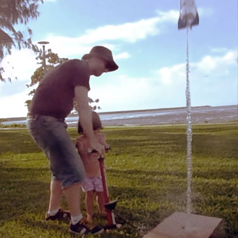 Photo of my daughter and I launching a SpaceX inspired bottle rocket.