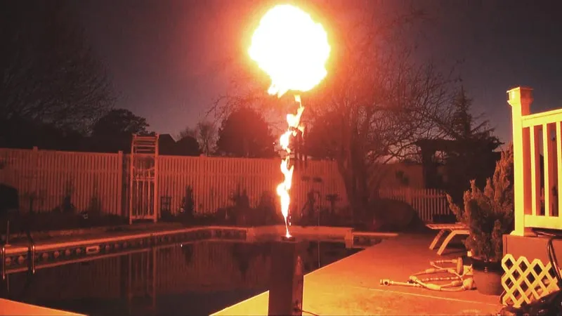 A photo of a DMX controlled flame thrower puffing fire.