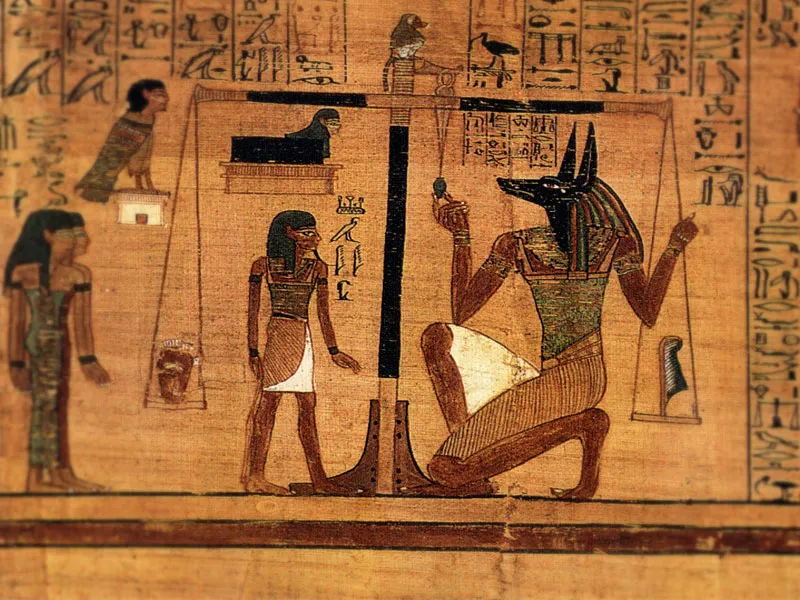 Weighing of the heart, taken from the book of the dead. Anubis weighing a heart against Maat's feather of truth.
