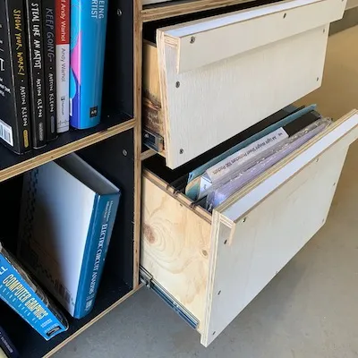 A photo of Tom Sachs inspired filing drawer in the open position.